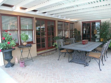 Large covered brick patio -- great for entertaining year 'round!