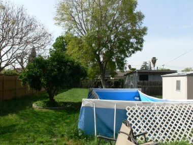 Large backyard with above-ground pool. 4494 Elmwood Ct., Riverside